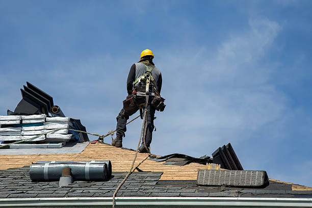 Professional Roofing technician working in Islip Terrace, NY